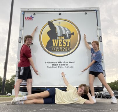 Shawnee Mission West Band students pose with the new Band trailer